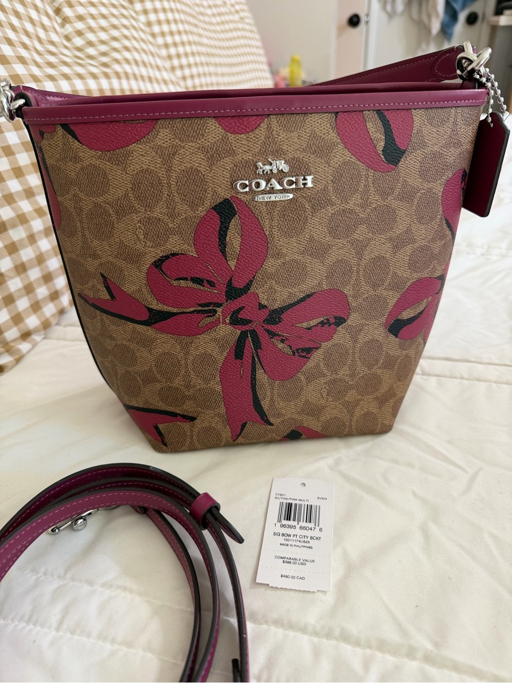 Coach Brown Signature Canvas Crossbody with Pink Bow Accents
